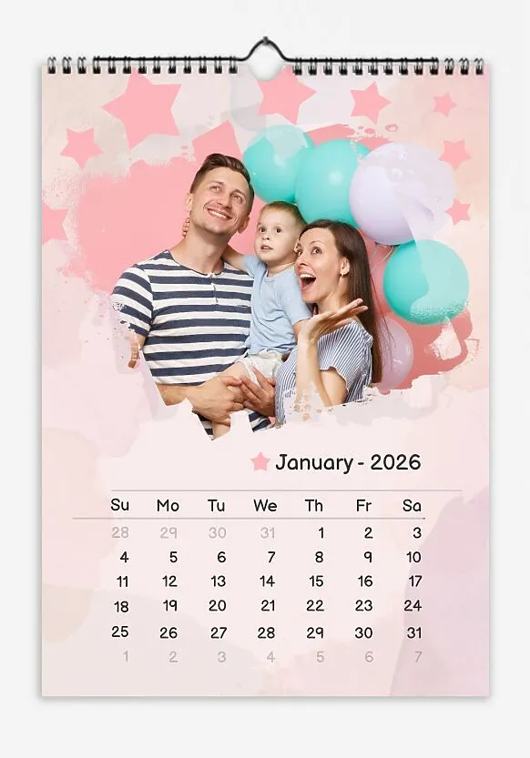 A free calendar template featuring a joyful young family with a son, featuring stars and balloons. The photo features grunge edges, a pastel background, and a playful font.