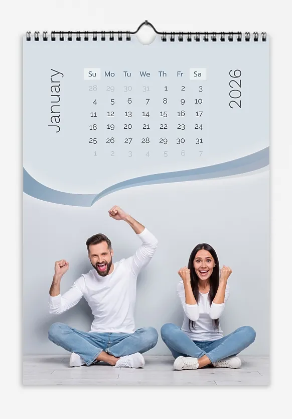 A bride and groom calendar template with background photos and a stylized bird-shaped ribbon.