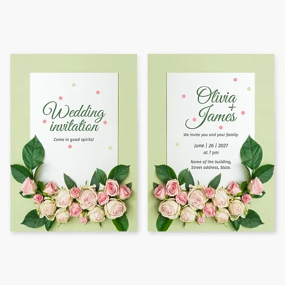 Wedding invitation with roses, paper, and confetti on a light green background
